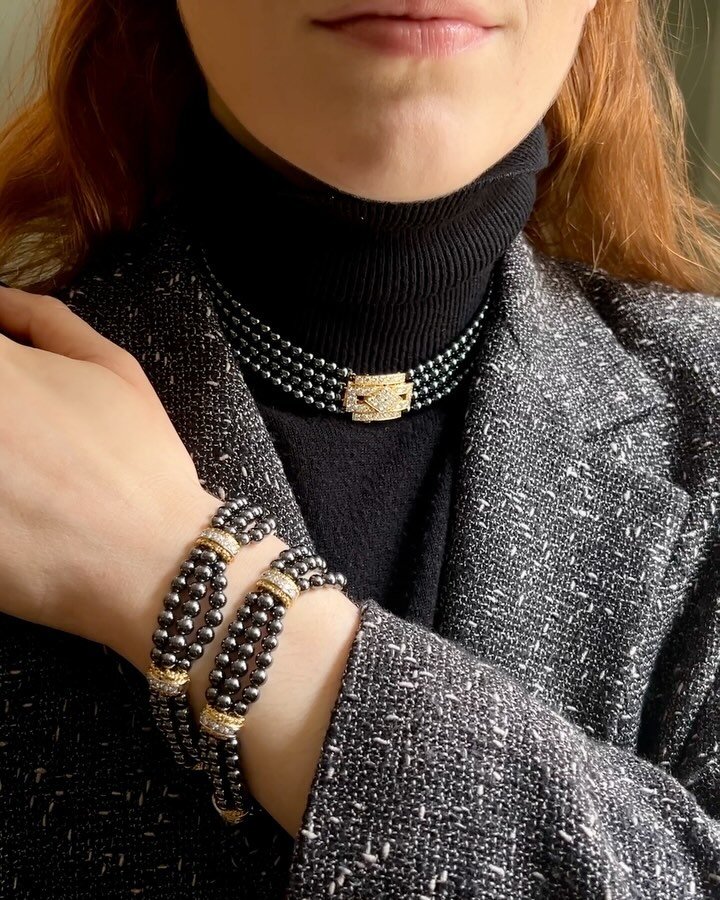 A diamond and hematite necklace by Van Cleef &amp; Arpels, the four strands of hematite beads on a pave set diamond clasp, mounted in 18kt gold. Shown with a pair of hematite bead and diamond bracelets by Van Cleef &amp; Arpels, each designed as a th