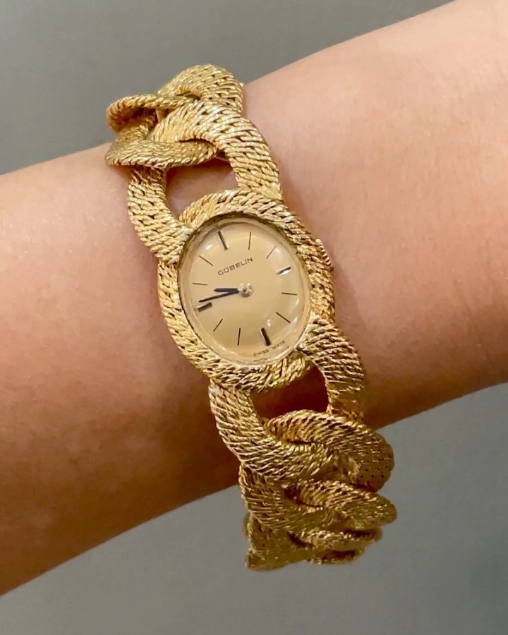 An 18kt gold watch by Georges Lenfant for Gubelin, the oval dial with baton numerals on a woven wire curb link gold bracelet. 6.75&rdquo; long. Available @simonteaklejewelry #georgeslenfant #georgeslenfantbracelet #georgeslenfantwatch #georgeslenfant