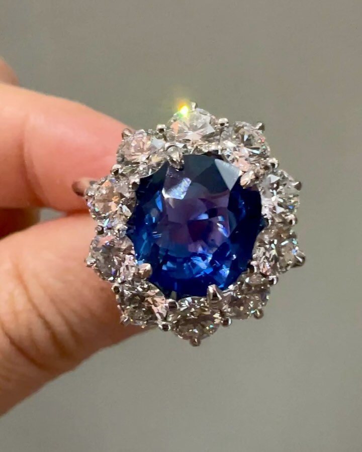 A 4.02ct oval cut sapphire (Ceylon, no heat) and circular cut diamond cluster ring, mounted in platinum. Available @simonteaklejewelry #ceylonsapphire #ceylonnoheat #unheatedsapphire #sapphireclusterring #unheatedsapphirering #ceylonsapphirering #sim