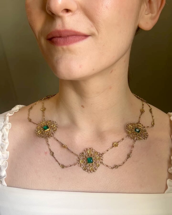 An antique green paste necklace, circa 1850, designed with five open cushion panel motifs with twin open chain link intersections, mounted in 18kt gold. Available @simonteaklejewelry #antiquenecklace #antiquejewelry #victorianjewelry #victorianjewell