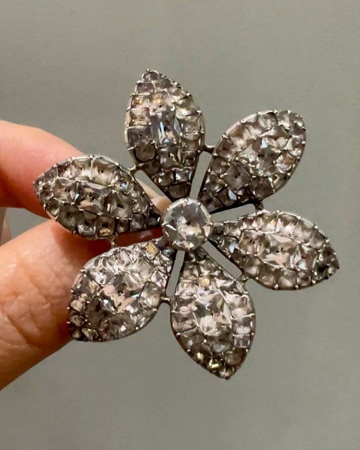 An antique paste brooch, English circa 1780, designed as a hexafoil pave set floral motif mounted in silver. Available $1,200 @simonteaklejewelry #antiquepaste #antiquepastejewelry #antiquepastejewellery #antiquepastebrooch #antiqueflowerbrooch #geor