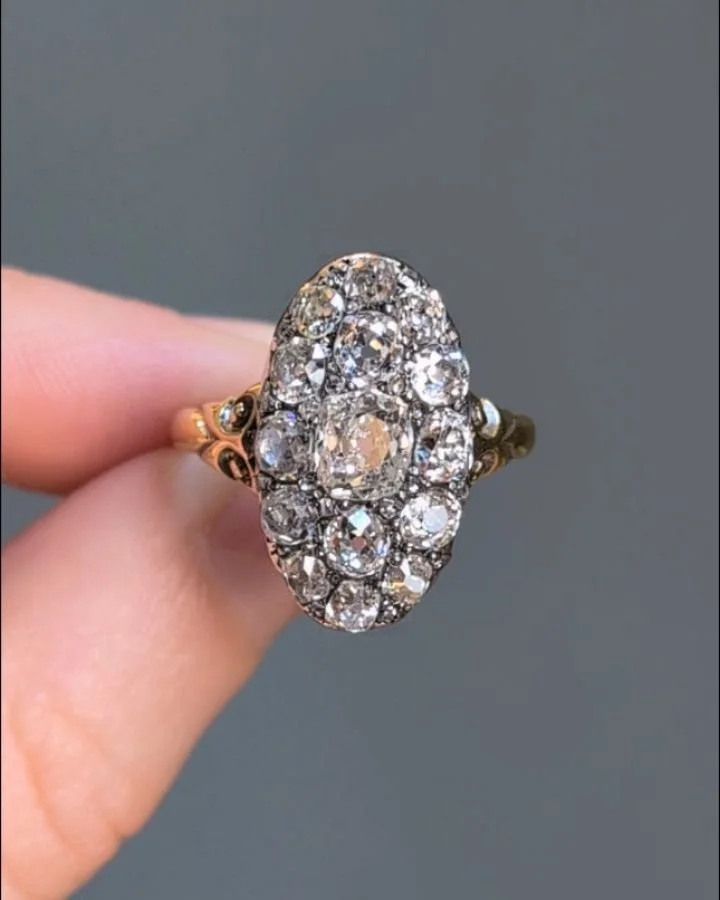 An antique diamond cluster ring, designed as an oval pave set diamond panel, mounted in silver and gold. Circa 1880. Available @simonteaklejewelry #antiquediamondring #antiquediamond #diamondclusterring #antiquediamondclusterring #simonteaklejewelry 