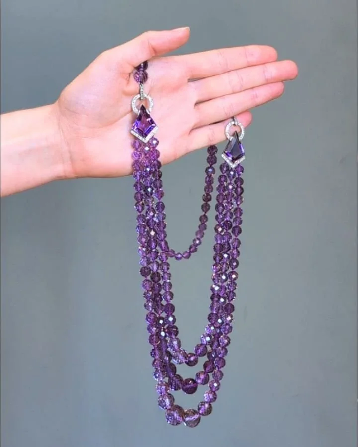 An Art Deco amethyst and diamond necklace, the front section with three row faceted amethyst beads with lozenge shaped spacers and single single row back. Paris circa 1925. Available @simonteaklejewelry #artdeconecklace #artdecojewelry #artdecoamethy