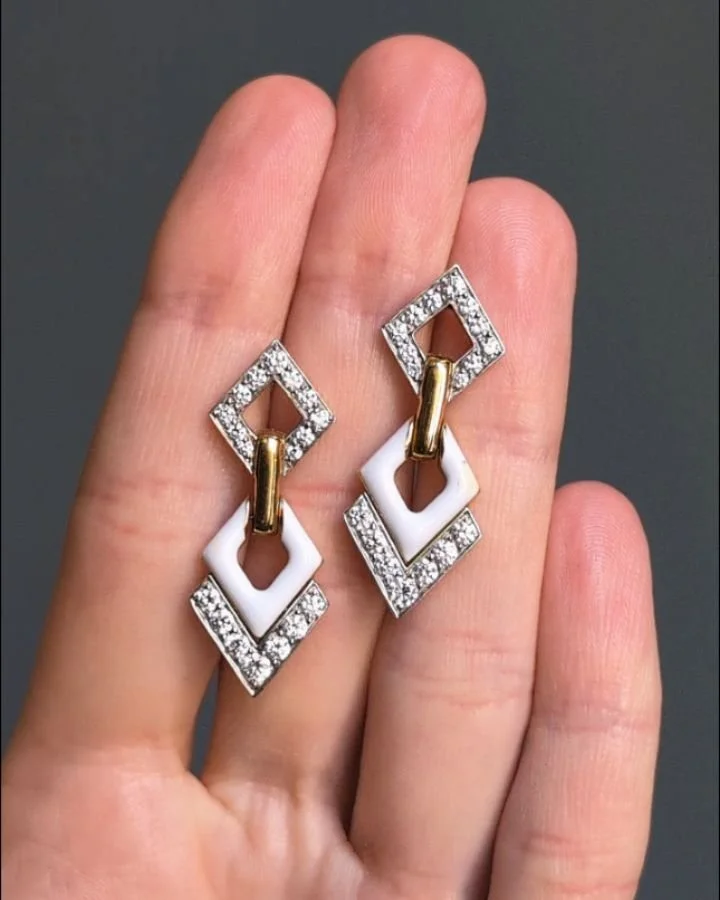 A pair of white enamel and diamond drop earrings by David Webb, each of lozenge panel and chevron design, mounted in 18kt gold and platinum. New York circa 2000. Available @simonteaklejewelry #davidwebb #davidwebbbracelet #vintagedavidwebb #davidwebb