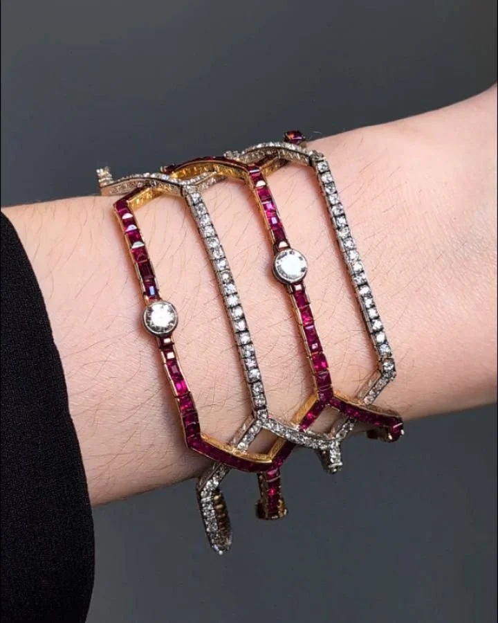 A Belle Epoque ruby and diamond bracelet, designed as elongated articulate lattice panels mounted in gold and platinum. Paris circa 1910. Available @simonteaklejewelry #rubydiamondbracelet #antiquerubybracelet #belleepoquebraceleet #belleepoquejewelr