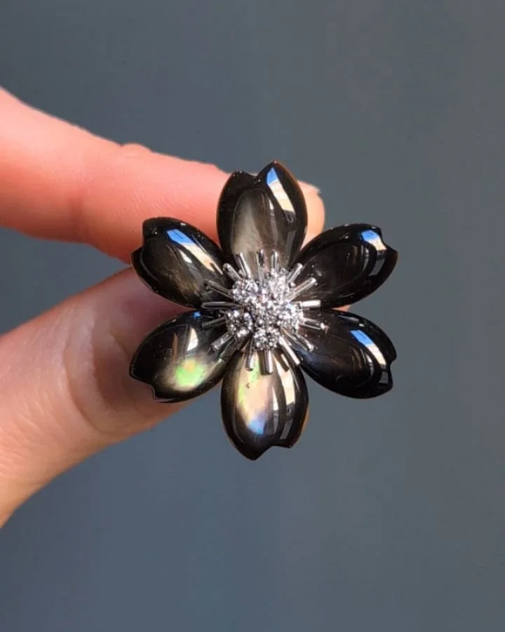 A gray mother of pearl and diamond &quot;Rose de Noel&quot; pendant, clip brooch by Van Cleef &amp; Arpels, on fine link chain. Available @simonteaklejewelry #vancleefarpels #vancleefandarpels #vcarosedenoel #vancleefrosedenoel #rosedenoel #simonteak