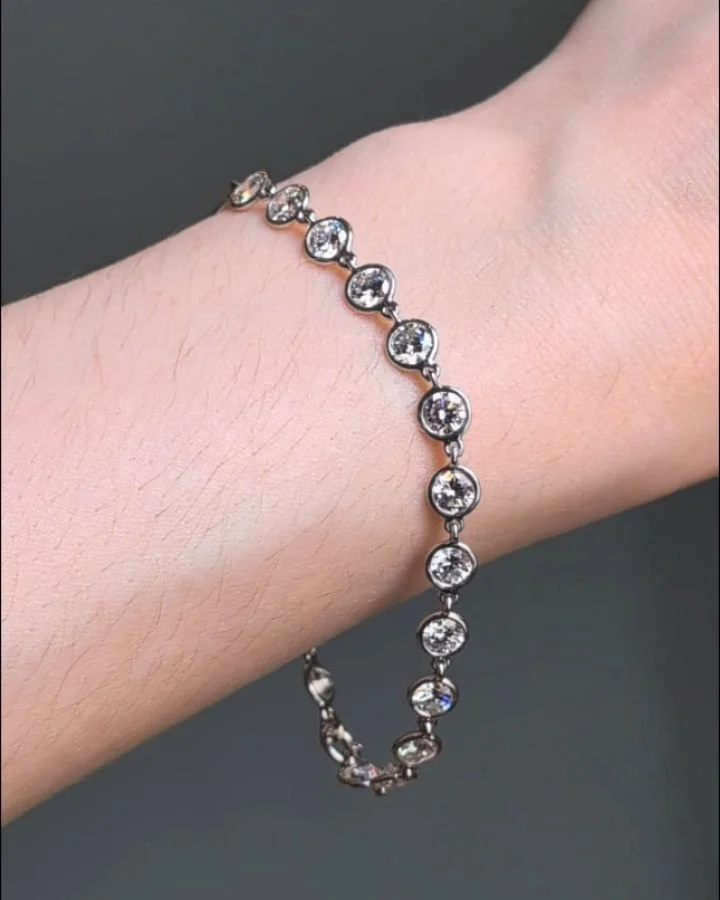 A circular cut diamond single line bracelet by Van Cleef &amp; Arpels, of spectacle link design, mounted in platinum. Paris circa 2000. Available @simonteaklejewelry #diamondbracelet #diamondlinebracelet #vca #vancleefandarpels #vancleef #vancleefarp