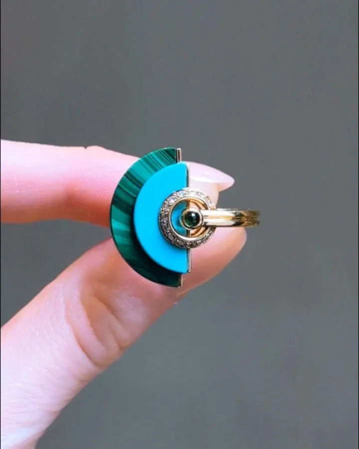 A carved turquoise and malachite 'Disc' ring by Kia Schwan @kiaschwan, set in an 18k gold diamond and tourmaline mounting. Available @simomteaklejewelry #kiaschwan #kiaschwanjewelry #kiaschwanring #statementring #turquoisering #carvedstones #carvedst