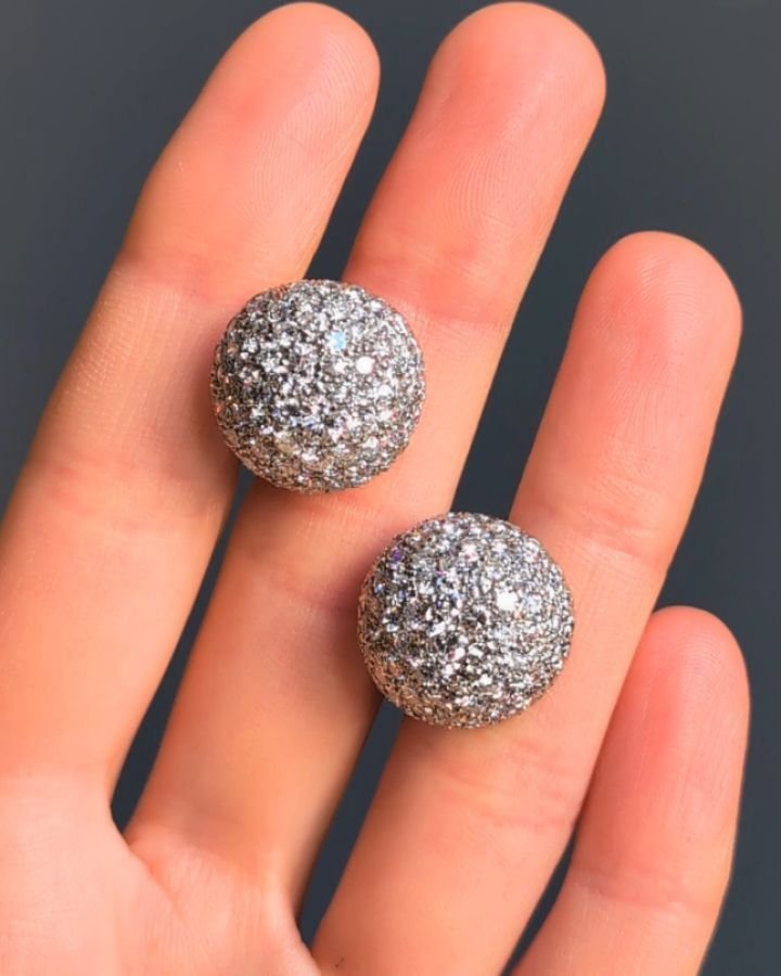 A pair of diamond earrings, of circular pave set dome design mounted in platinum. Available @simonteaklejewelry #diamondearrings #diamonddomeearrings #diamonddome #simonteaklejewelry #simonteakleavailable