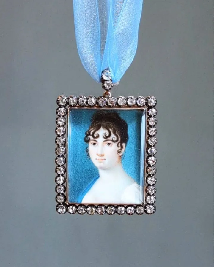 An antique portrait miniature and diamond pendant, the rectangular shoulder length female portrait, with an old mine cut diamond surround, mounted in silver and gold. English circa 1830. Available @simonteaklejewelry #georgianjewellery #georgianjewel