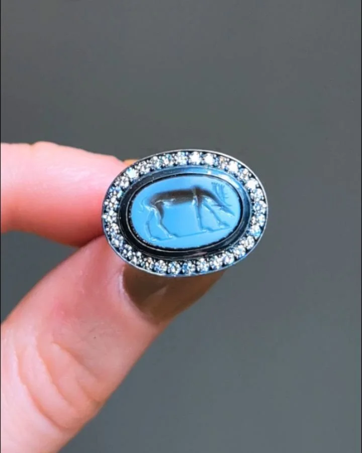 An ancient intaglio and diamond ring, the oval nicolo onyx intaglio depicting a stag with a diamond surround, mounted in silver and 18kt gold. Intaglio Asia Minor 2-1 century BC. Available @simomteaklejewelry #intaglio #ancientintaglio #ancientjewelr