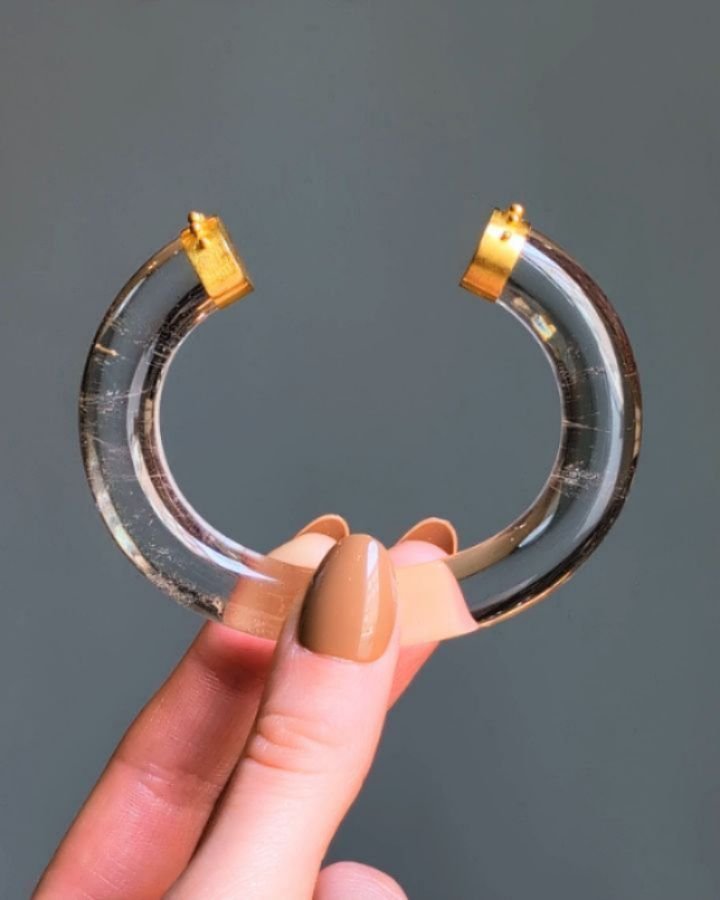 A rock crystal bangle by Loren Nicole, of oval form with 22kt gold beaded terminals. Available @simonteaklejewelry #lorennicole #lorennicolejewelry #lorennicolebangle #rockcrystalbangle #22ktgold #simonteaklejewelry #simonteakleavailable
