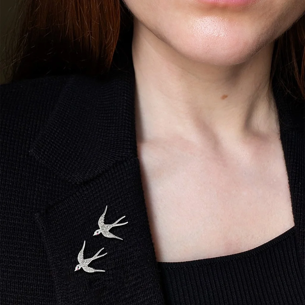 7413 - Pair of Diamond Swallow Brooches Model Web.jpg