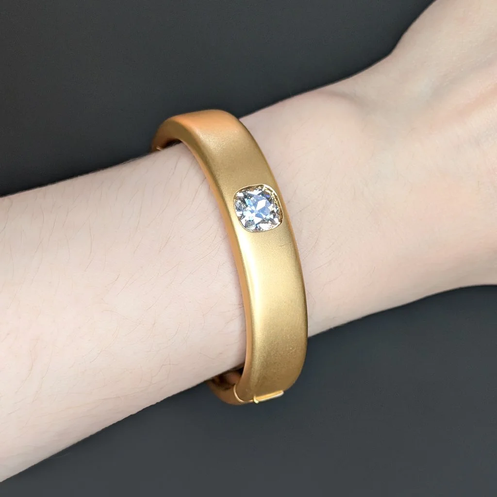 7188 - BrushedGoldDiamondBangleModel.jpg