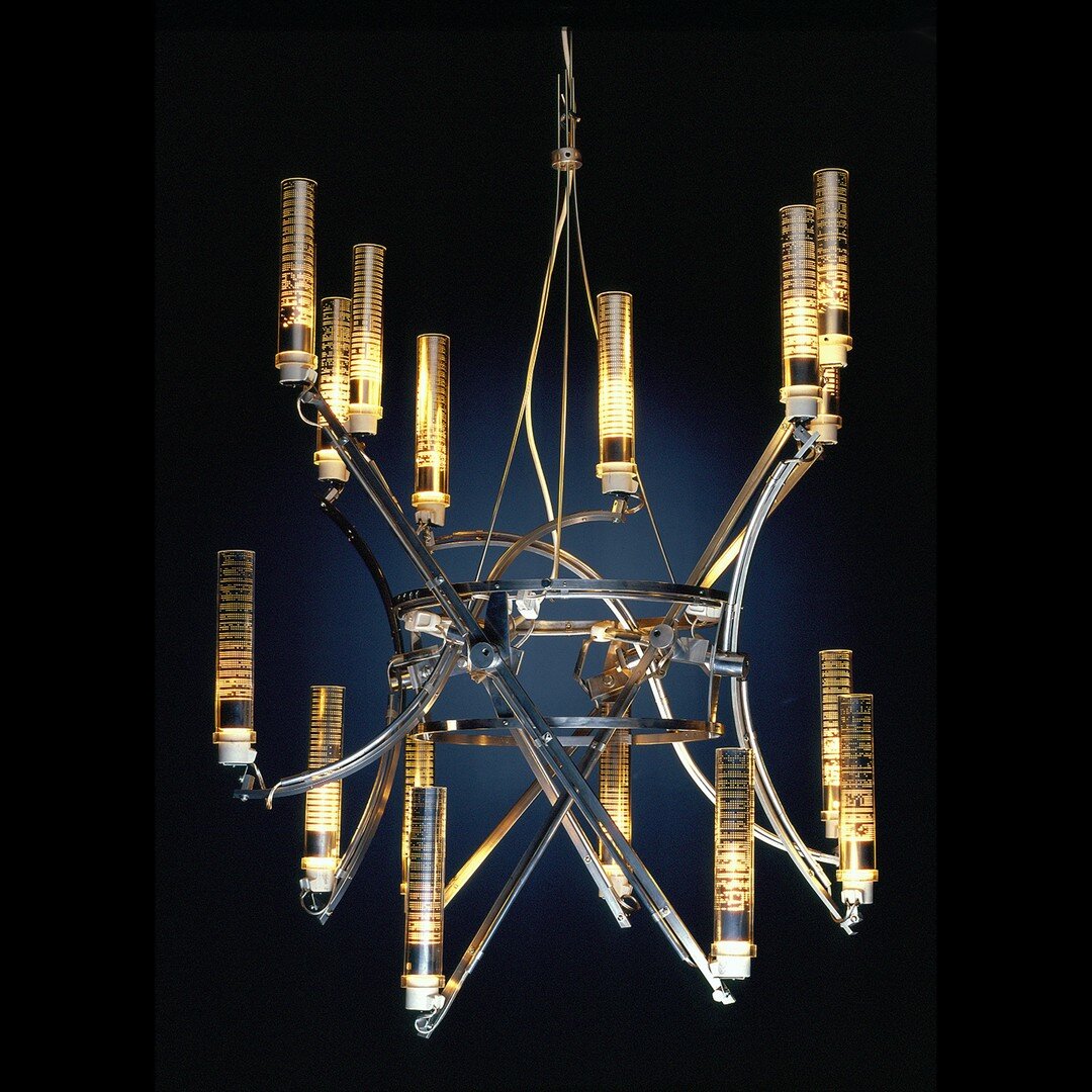 Chandelier commission for a Chicago residence 
𝘾𝙞𝙩𝙮 𝙤𝙛 𝙇𝙞𝙜𝙝𝙩, 1983
aluminum, steel, cylindrical bulbs, 
Lucite with porcelain sockets
48 x 48 x 44 inches
&copy; Gary Justis 

@springboard_arts
@arcadeproject_curatorial
@mannekenpress