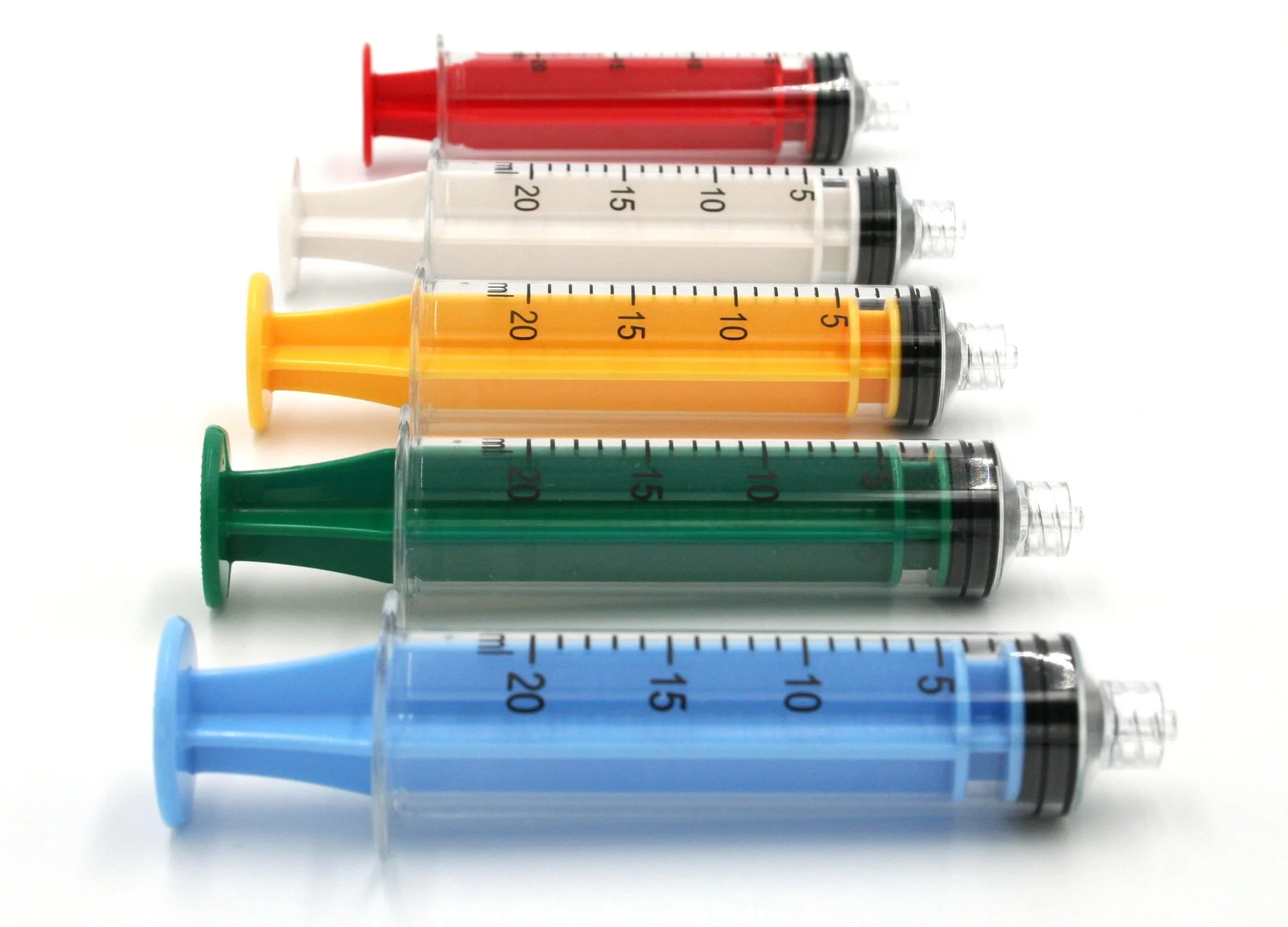 20cc polycarbonate syringes shown above in blue, green, yellow, white, and red