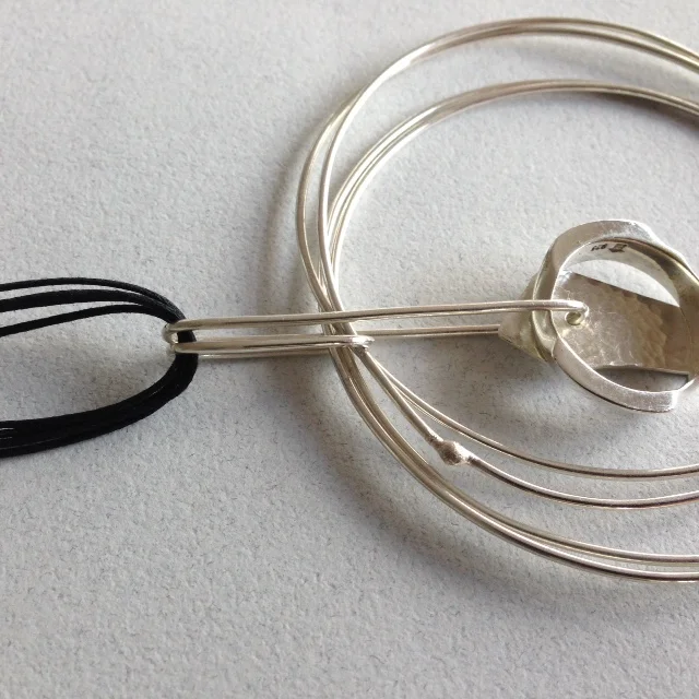 Susie Woodhouse Sterling silver Neckpiece on cord.JPG