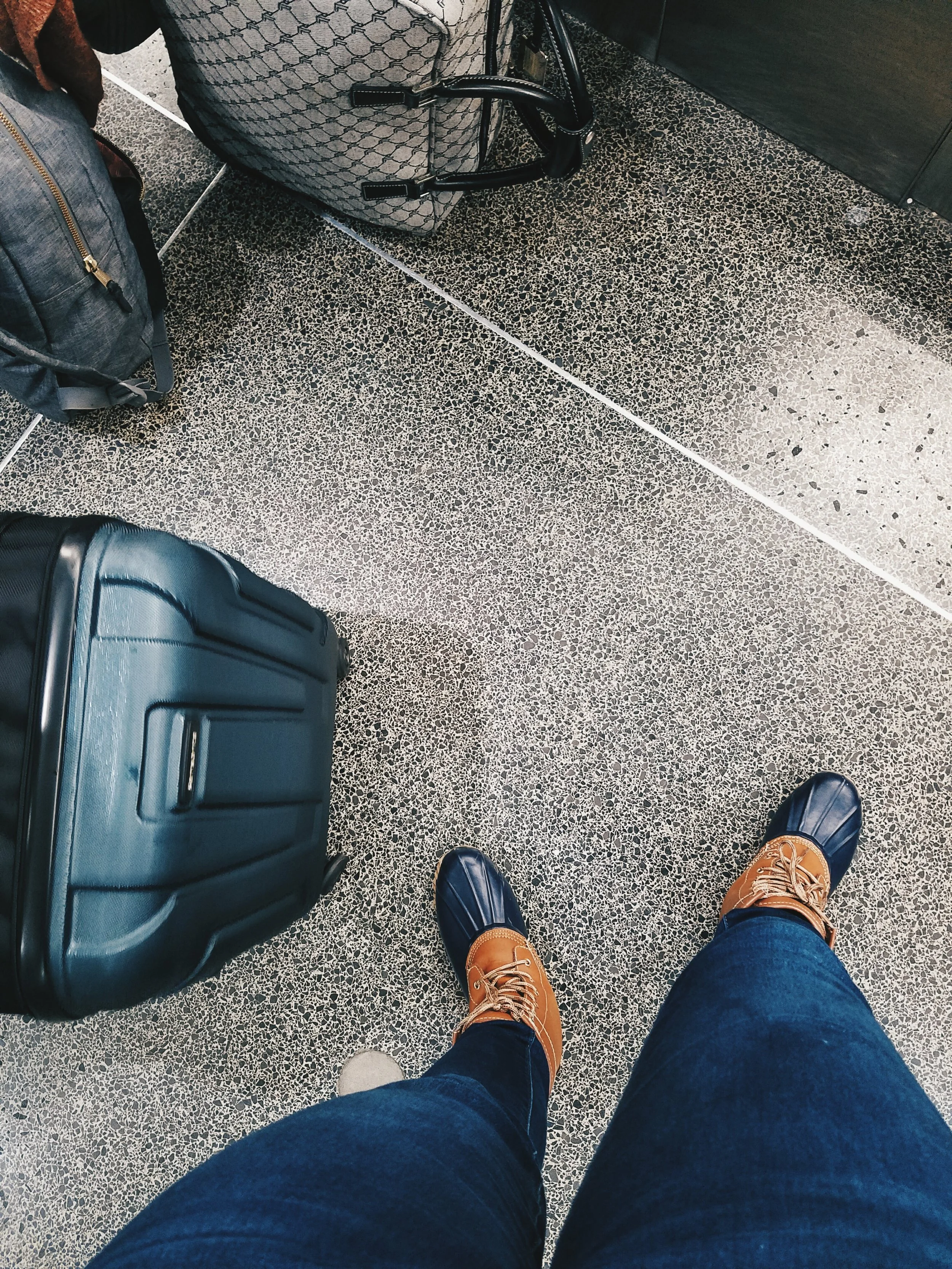 Friendly reminder that you'll have to take off your shoes as part of security. If weather permits, sandals make a much better option than rain boots.
