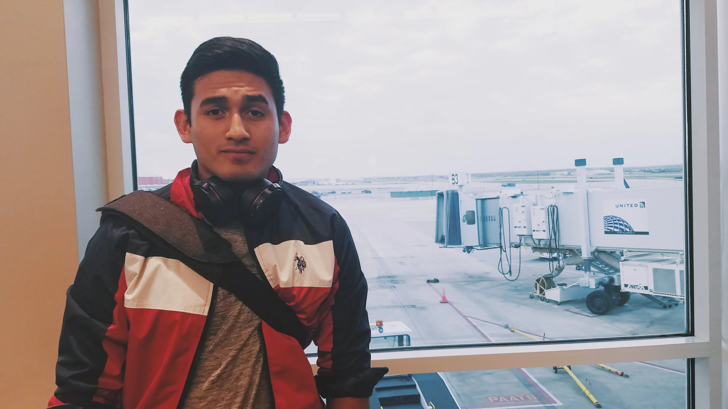 My boyfriend, Alec, while we were waiting to take off in San Antonio. He's the one who inspired the bit on understanding the reality of flying. Every time we take off, he talks stats to relax.
