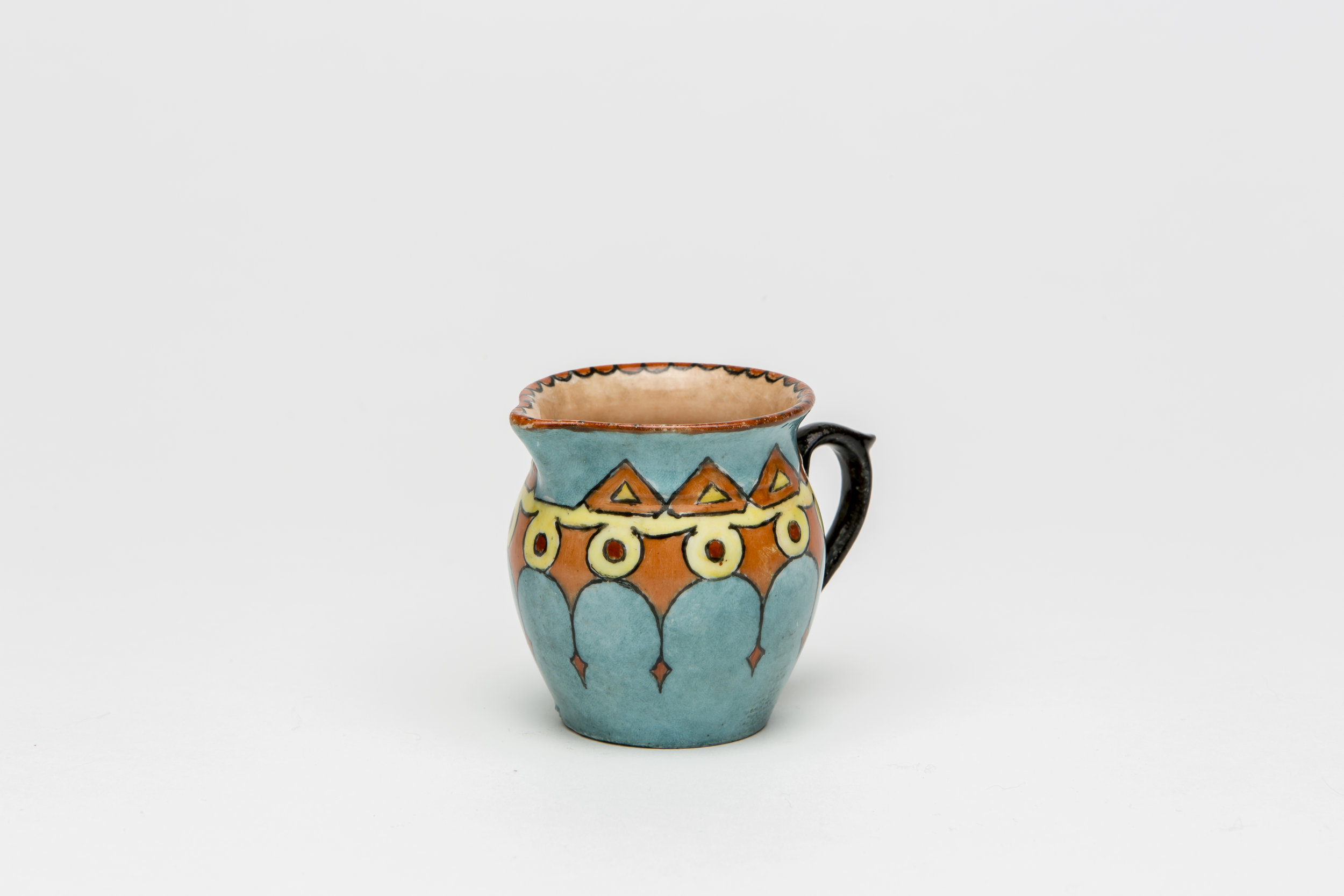  Maude Gum, 1885-1973,  China painted jug , c 1920-30s, 6.5 x 5.5cm.&nbsp; 