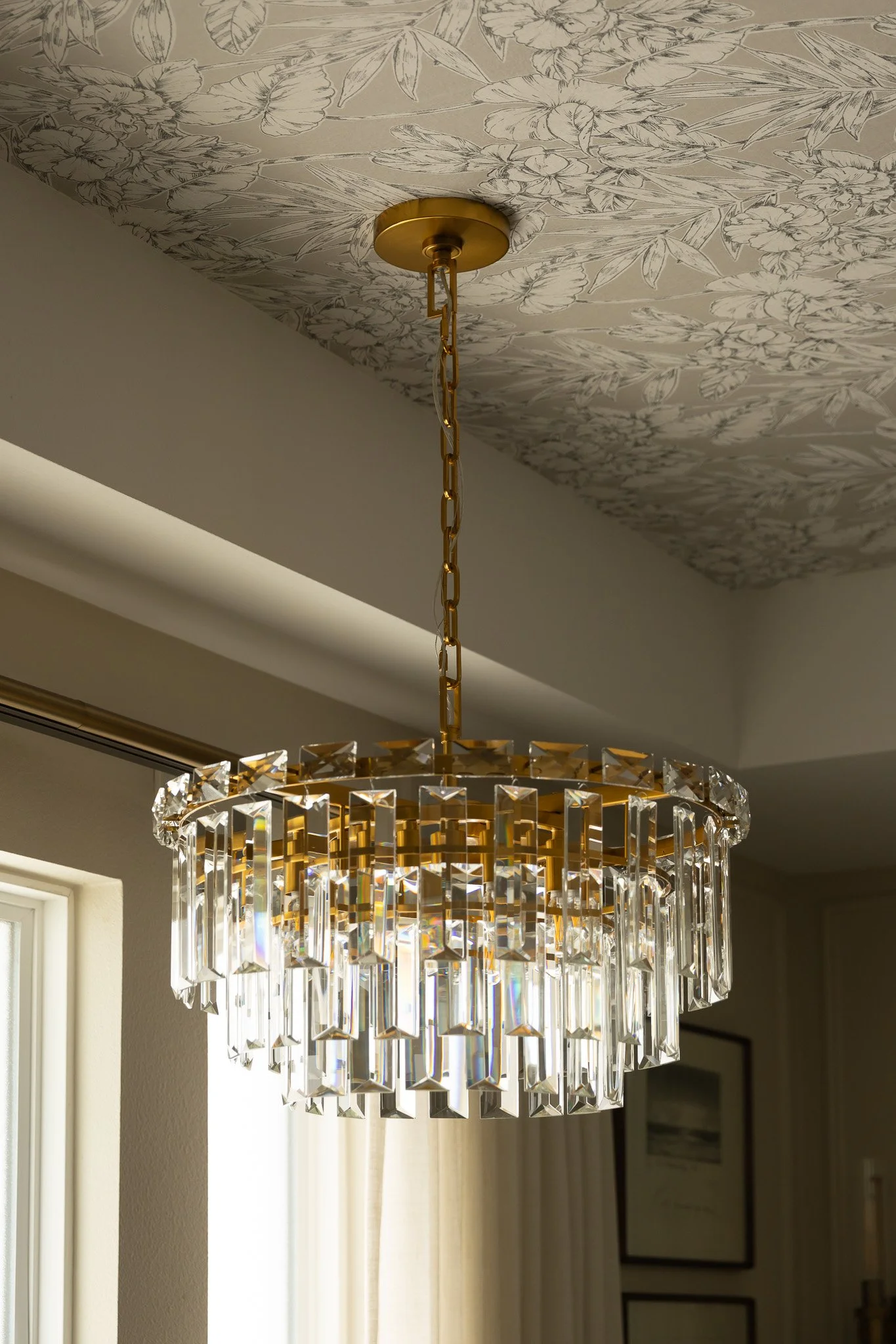 Wallpapered bathroom ceiling with crystal chandelier