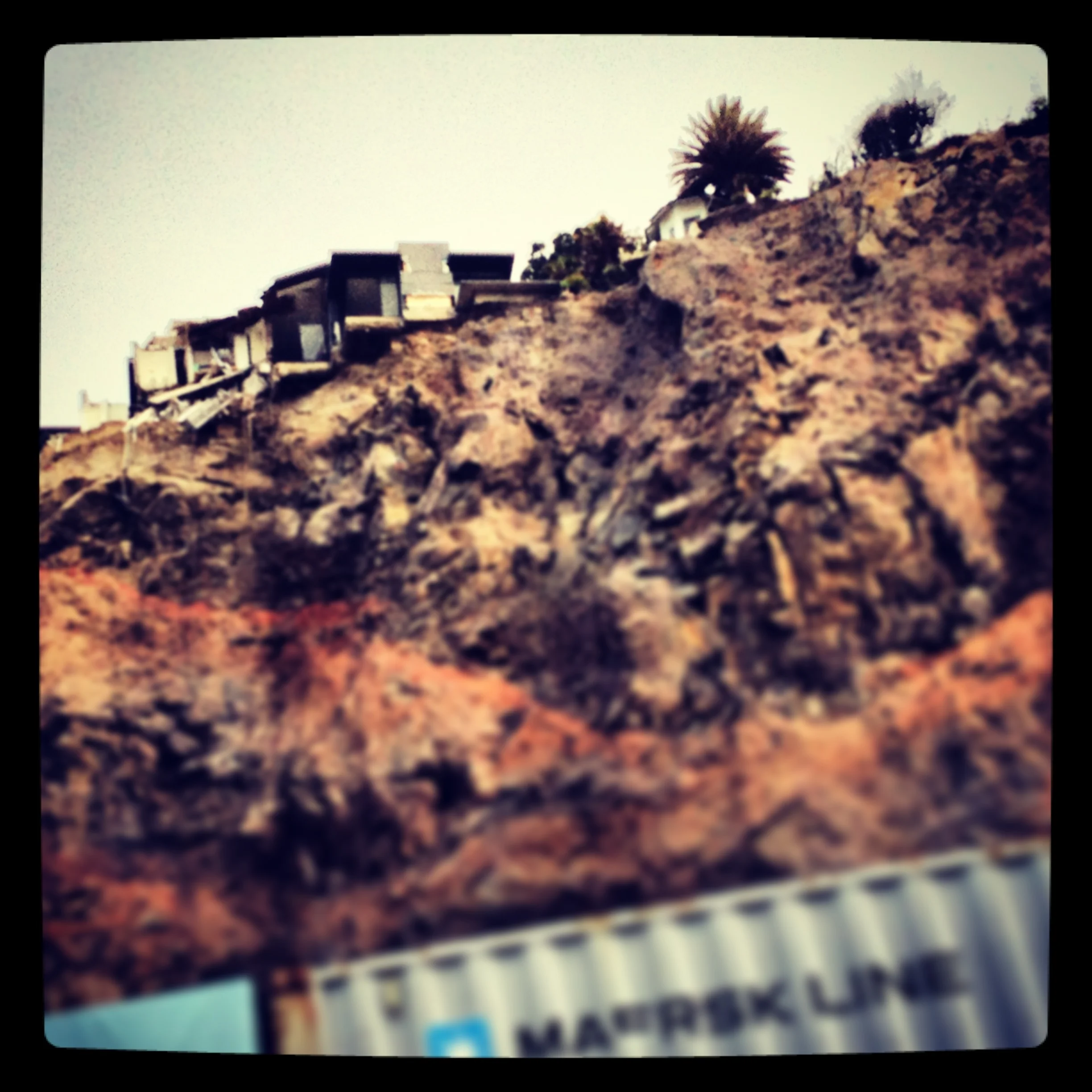     The cliff is gone. The house, stays.    