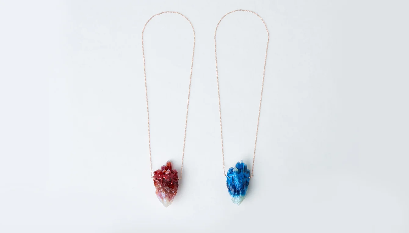 Heartstone Pendant. Resin on rose gold. Image courtesy NGV design store. Styling: Natalie Turnbull. Photography: Tomas Friml.