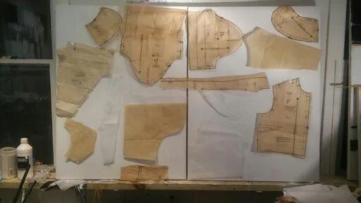 The starting stage of my earlier Deconstructed works, pinning and moving tailoring patterns around to find a composition that satisfied me.