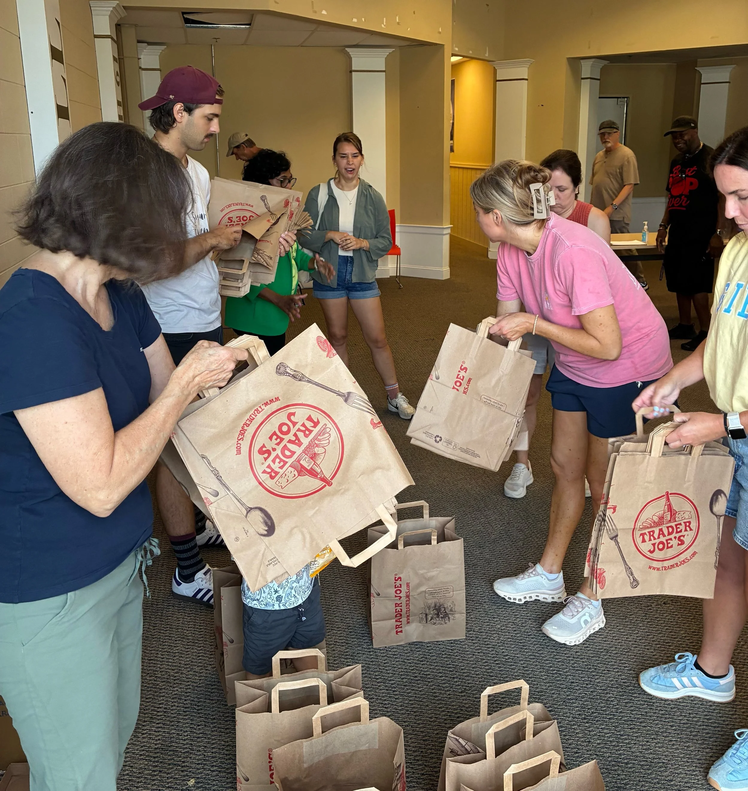 This past Saturday, Thorn Grove was able to serve alongside 13 other churches in the area, all trying to be good neighbors! Together we were able to unload food trucks, organize and hand out food, give away clothing, and backpacks to families in East