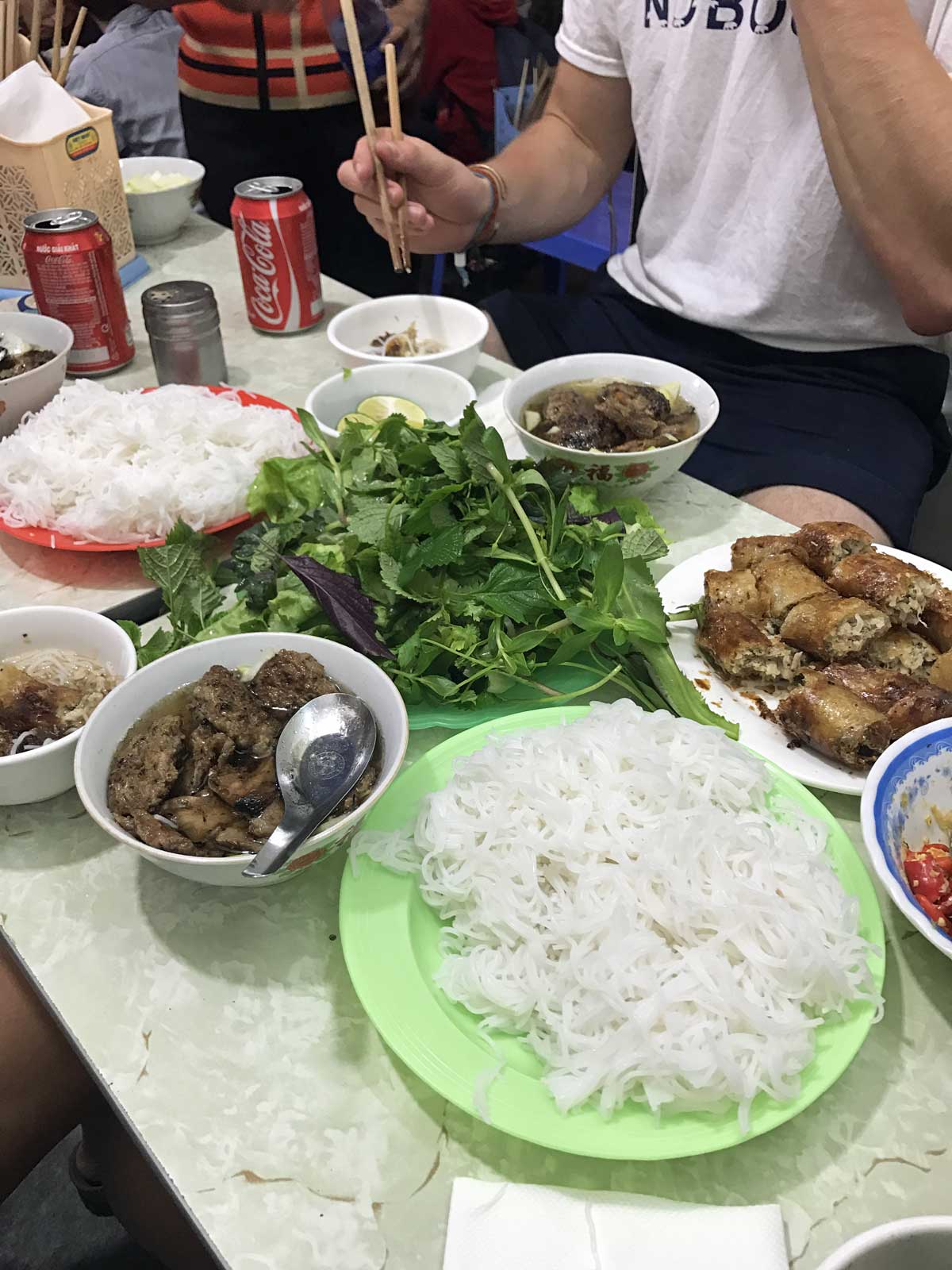(Left) The Old Quarter, (Right) The crew enjoying bun cha in said Old Quarter: Bun Cha Nem Cua Be Dac Kim.