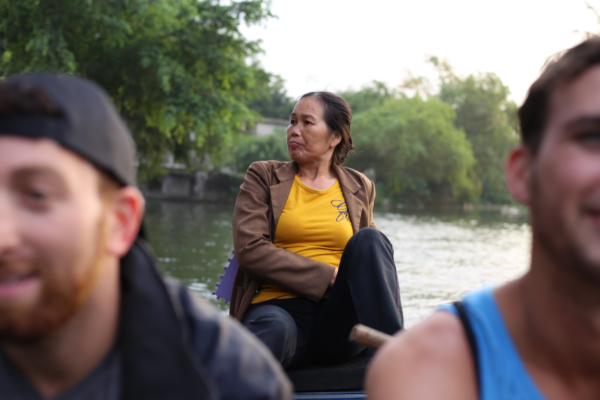 Aaaand here's us on the boat. Our badass boat driver is ROWING THE BOAT WITH HER FEET.