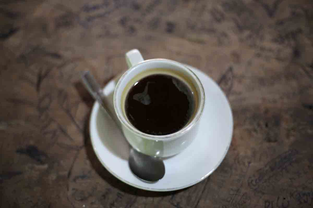 An ordinary cup of coffee, except it's made from cat feces. 