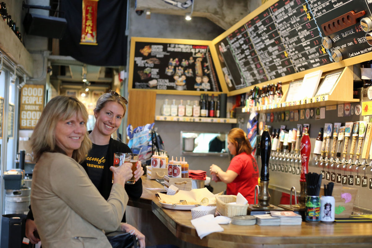 My mom flew in to hang out with me to help me recover from my injury. Since I couldn’t walk, I had about a week where I was wheeled alternately between dumpling destinations and craft breweries. Here we are sipping brews at the Roundhouse, our favorite craft beer bar in Hong Kong.