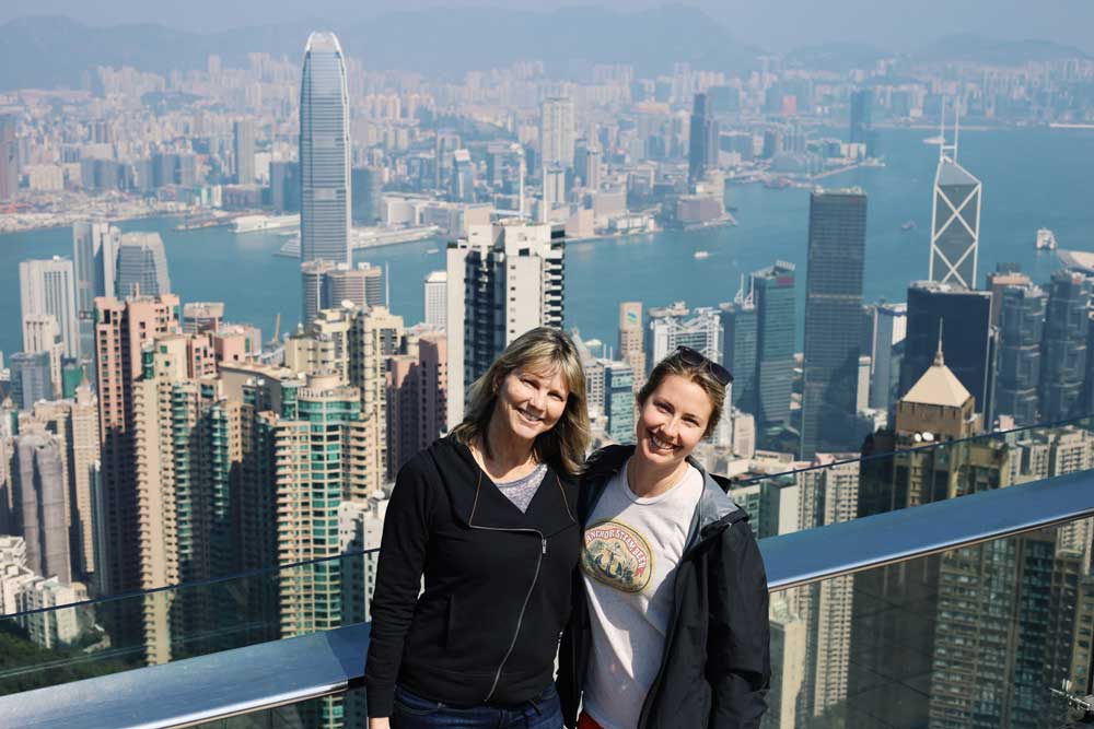 Mother and daughter on top of Hong Kong, matching head tilts and all.
