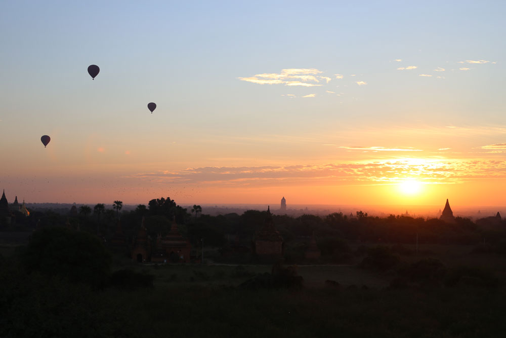 Balloons over Bagan at sunrise.