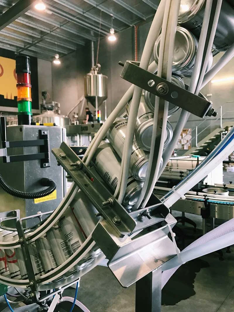 The Moo Brew canning line.