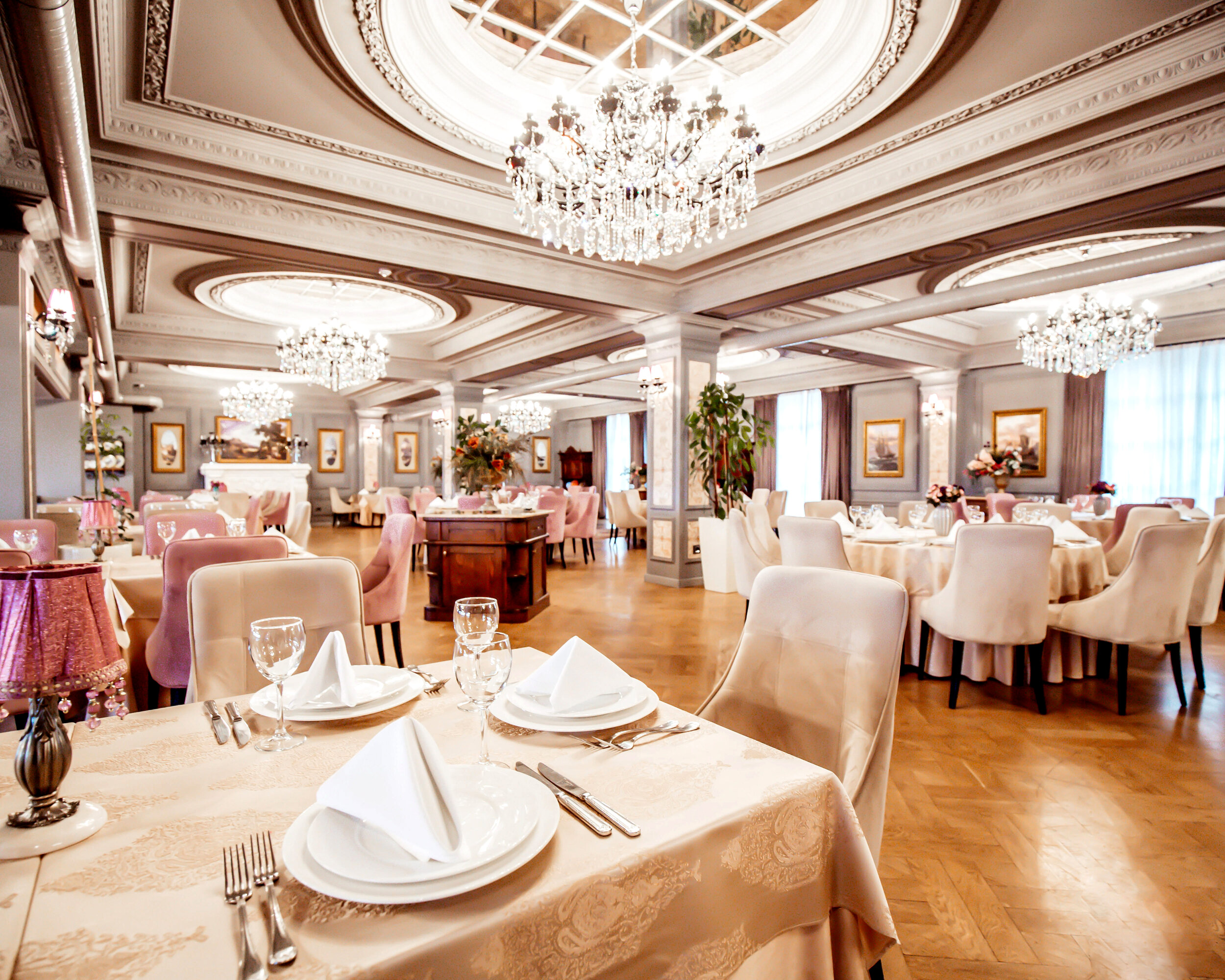 restaurant-hall-with-round-square-tables-some-chairs-plants.jpg