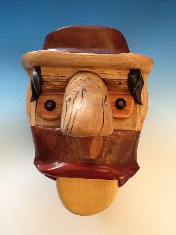 "Yellow Tang" Satinwood Lips: Bloodwood, Face: Myrtle, Beef Heart, Nose: Spalted Maple, Lacewood Eyes: Vera, Ebony, Tulipwood Forehead: Vera, Ebony, Zebrawood, White Oak, Bolivian Rosewood