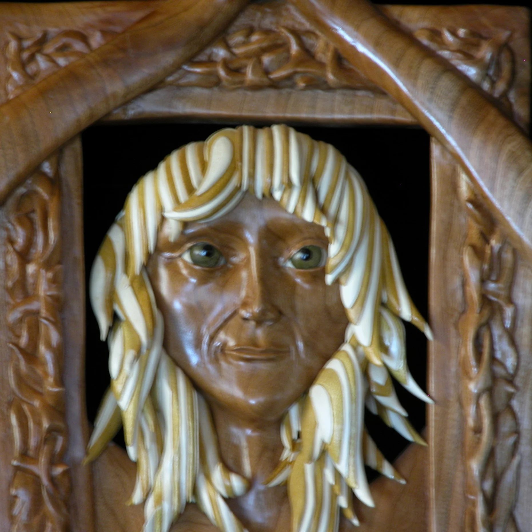 Namaste close-up:  Holly and satinwood hair; vera, holly and ebony eyes; cherry wood frame and body