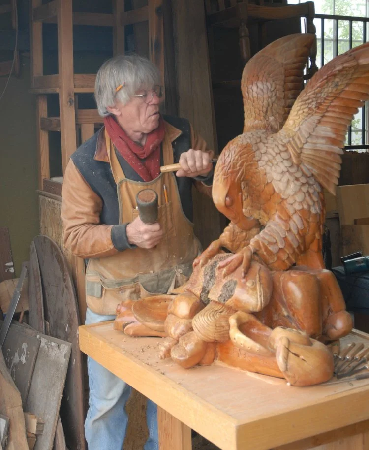 Larry chiseling "Sacred Feast"