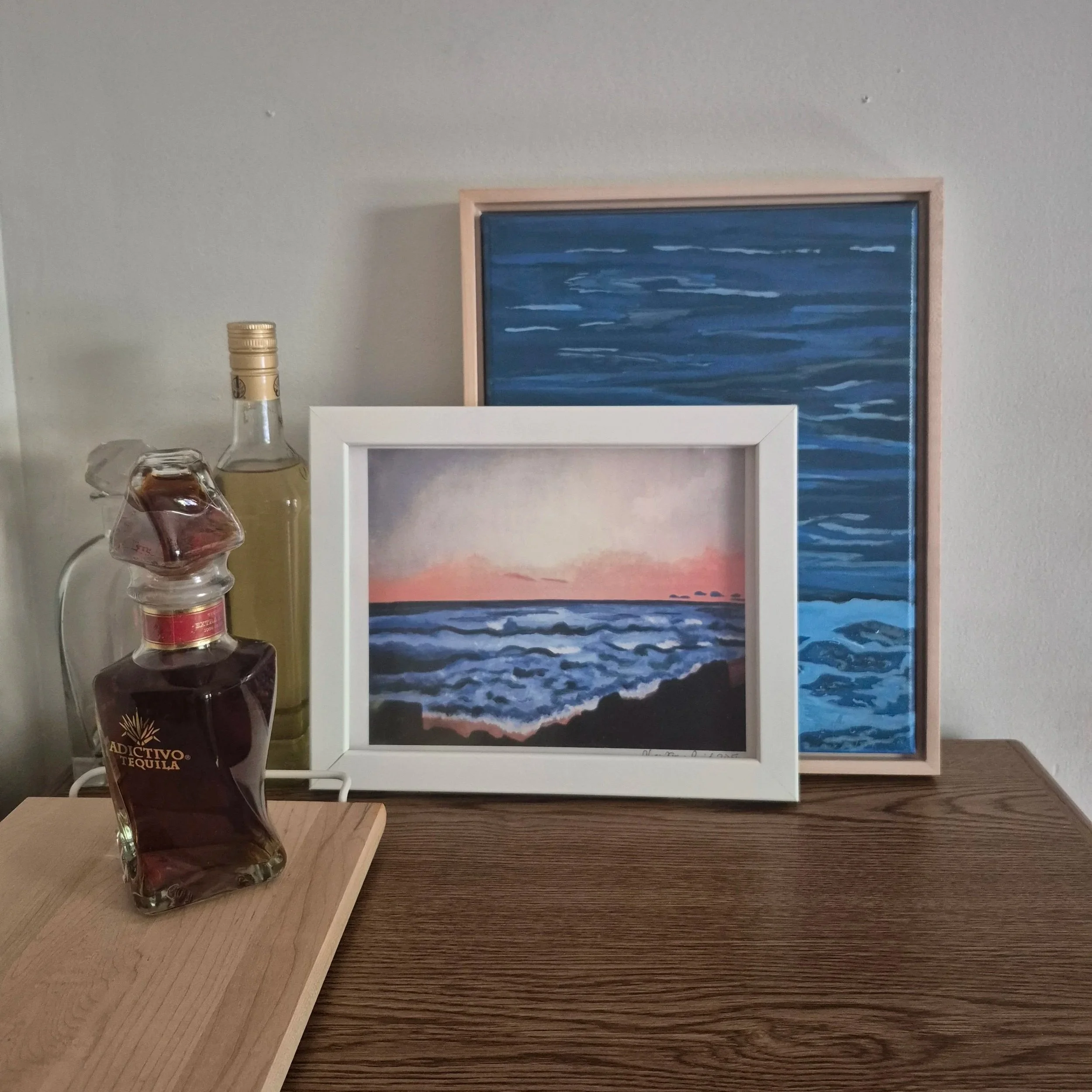 Sunset+at+Germaine%27s+Beach+Print+in+frame+with+anejo+tequila.jpg