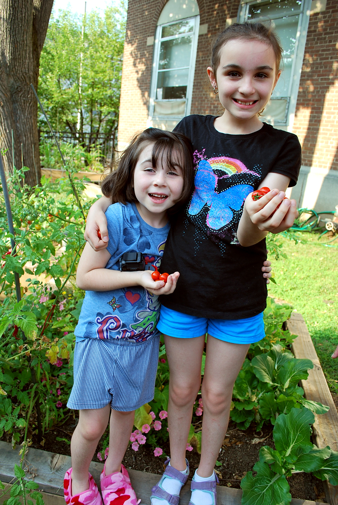 2012 July Leia and Elle in garden with veggies 006.jpg