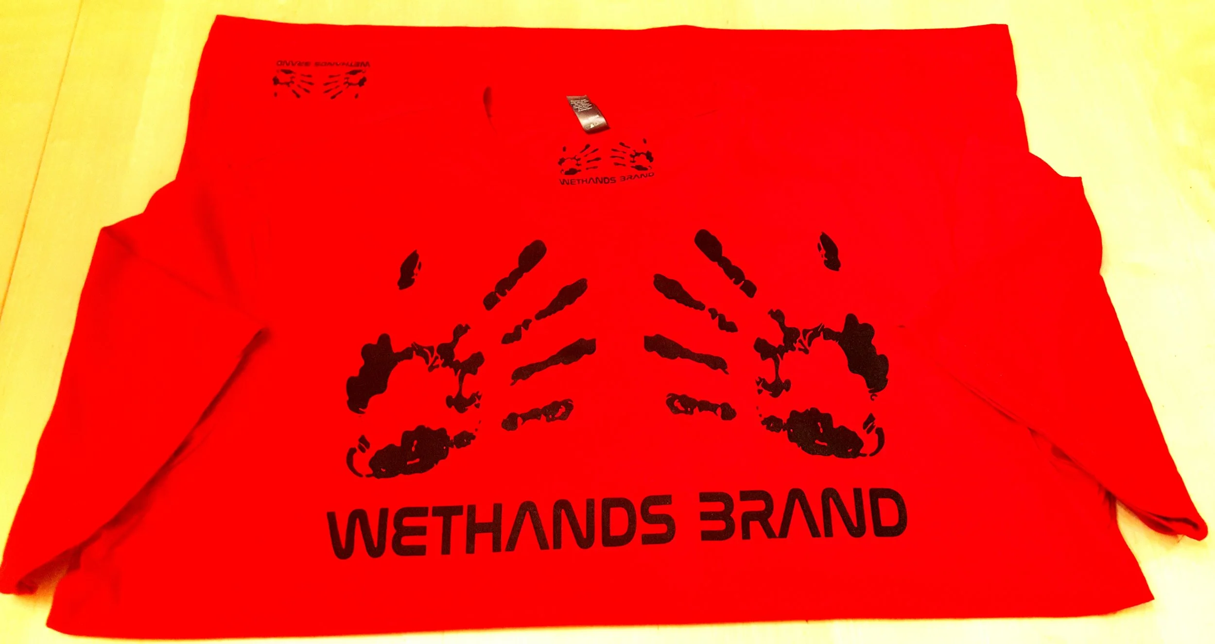 WETHANDS BRAND LOGO T RED 