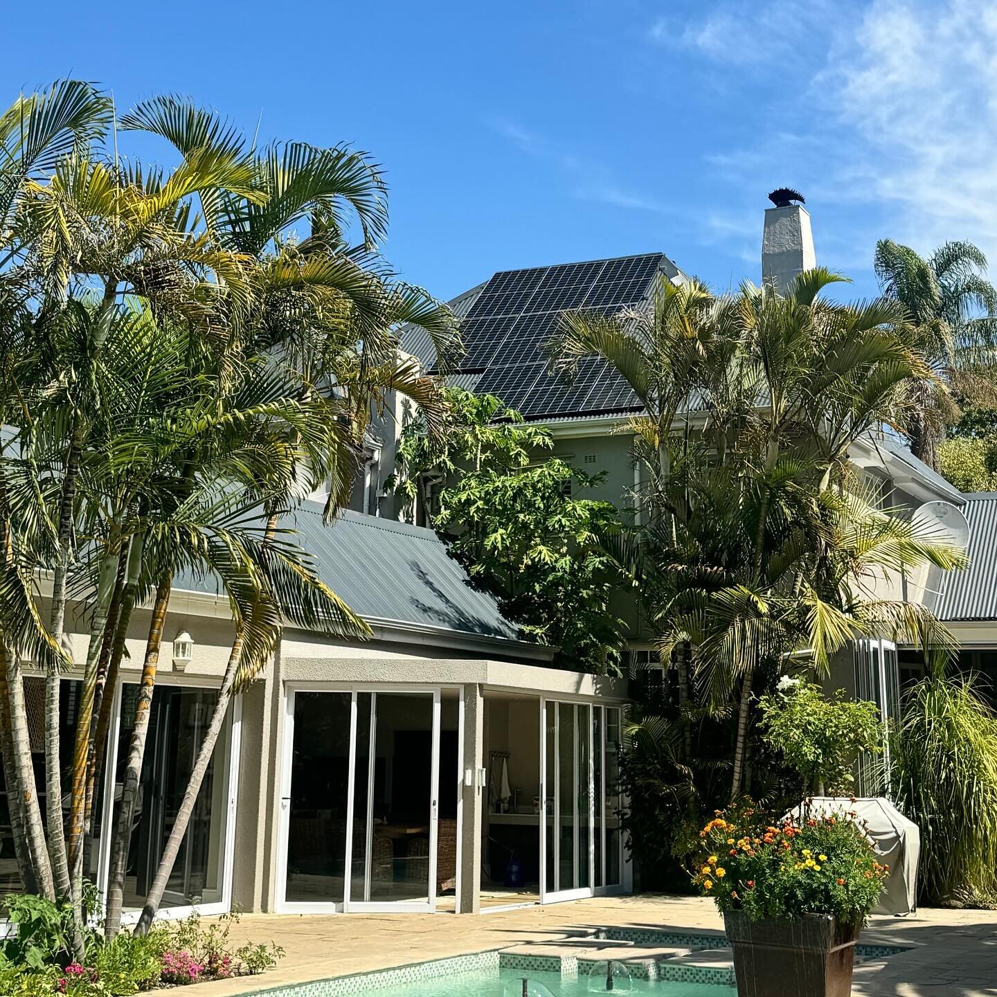 Here is one of our latest projects. Here you can see one of our personalised energy systems designed to power this large family property. This home has three independent solar panel roof sections that work together to balance morning to late afternoo