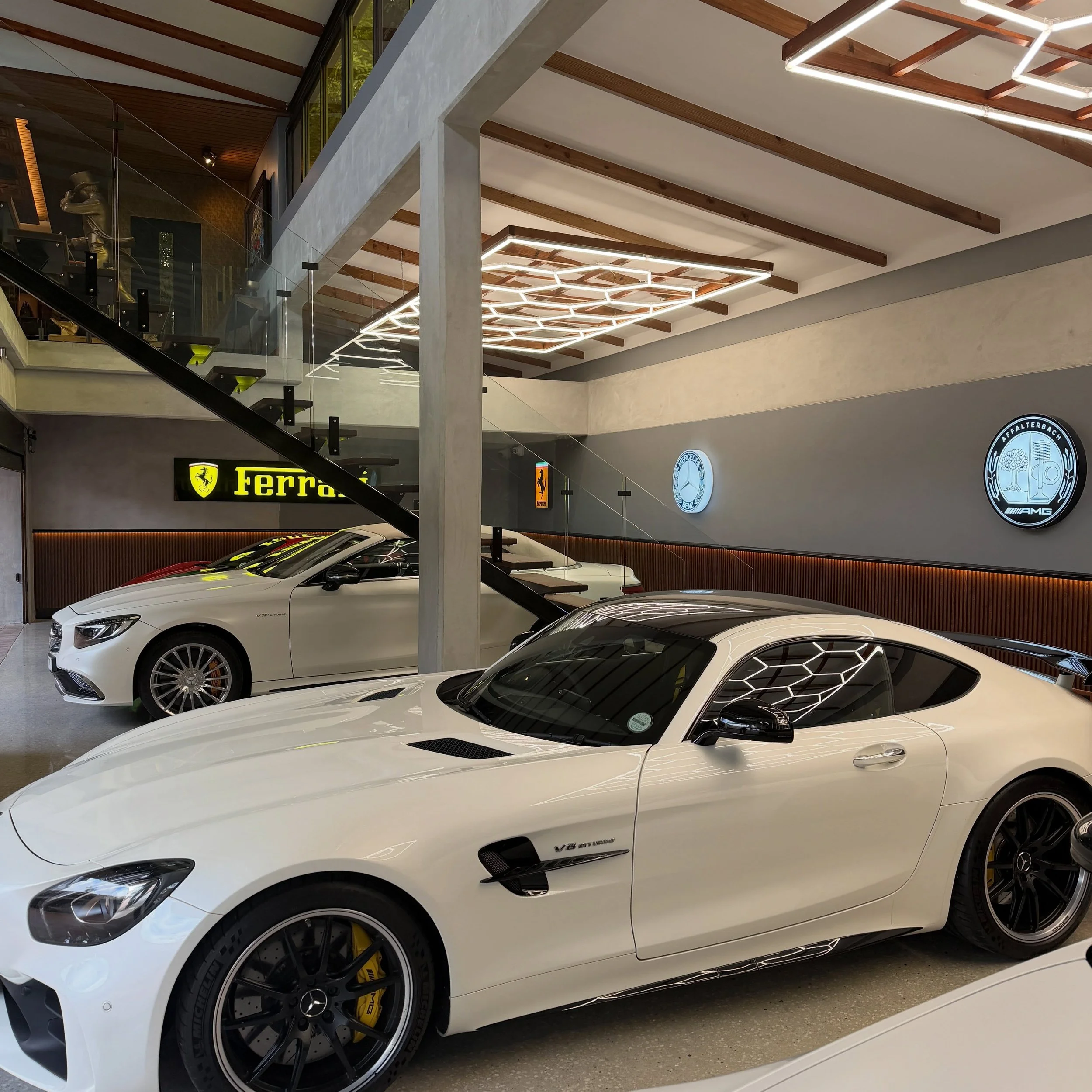Finishing touches on this fully automated man cave / car garage / cigar lounge. From access control, IP surveillance, lighting automation &amp; control, water fountain automation to audio distribution and dedicated lounge audio. We enjoyed every hour