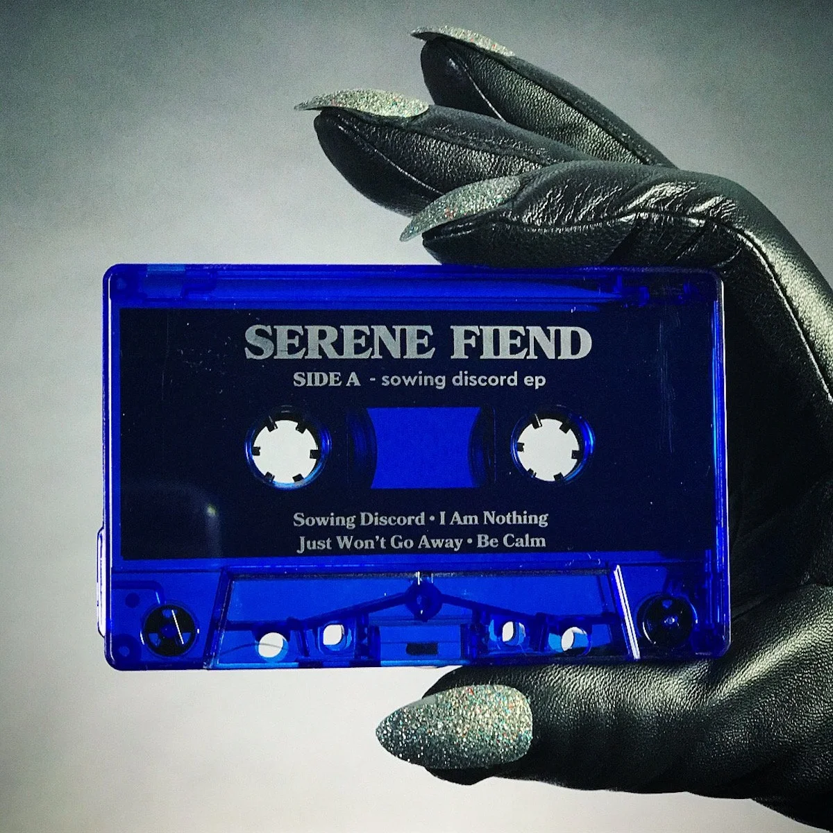 Sowing Discord tape Hand.jpg