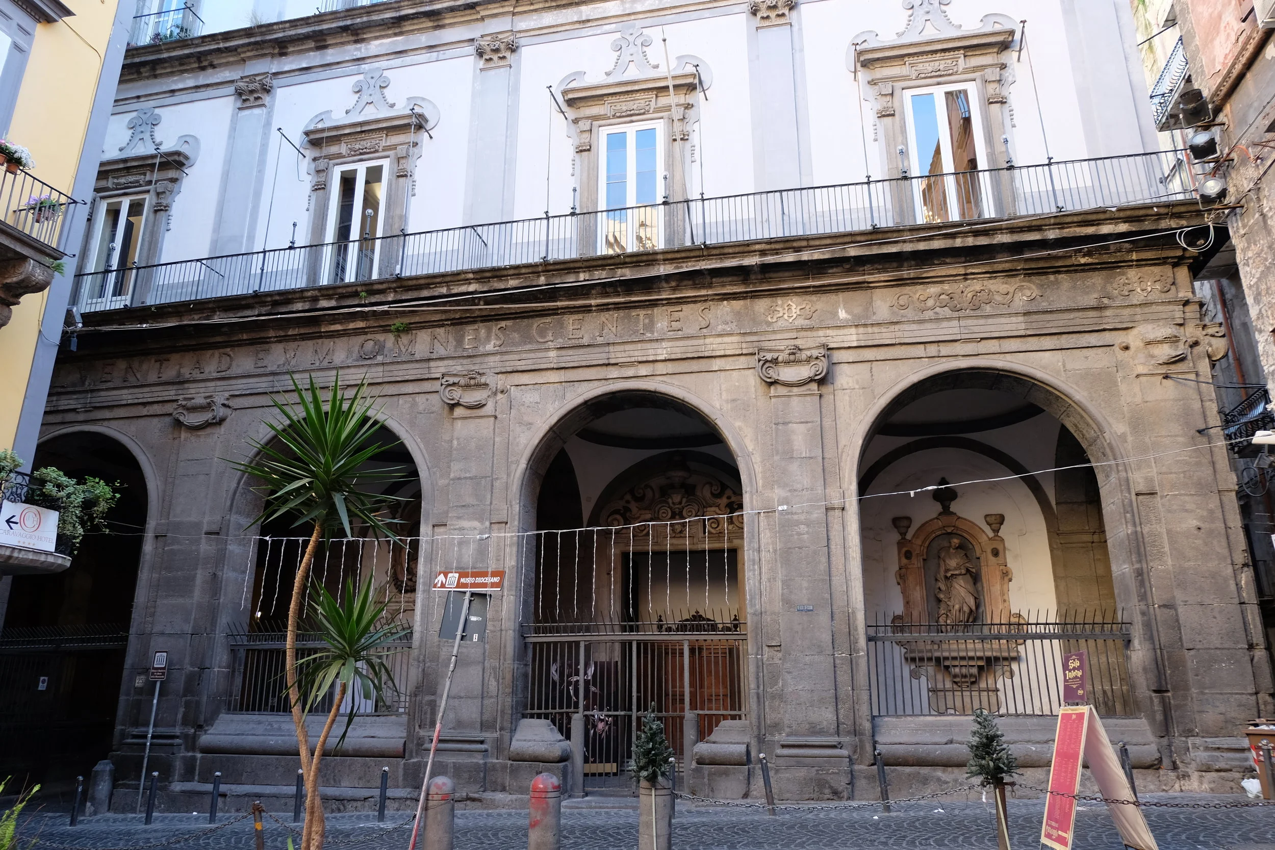 The entrance to the museum and the church is on the side.