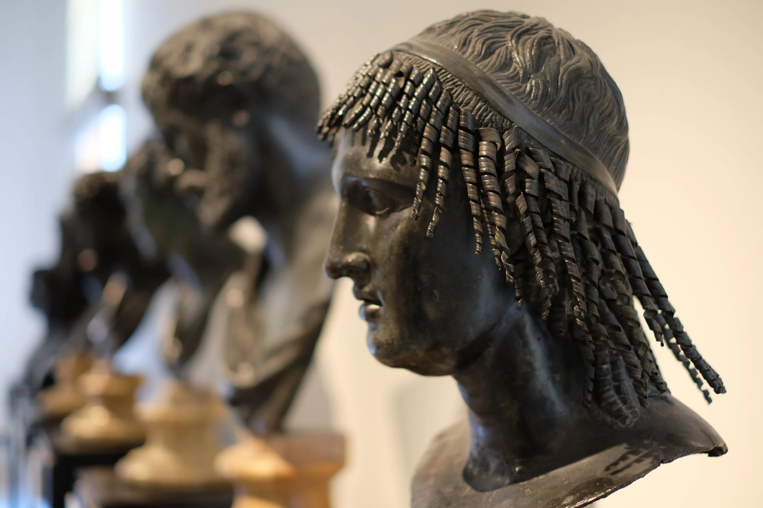 Row of busts.