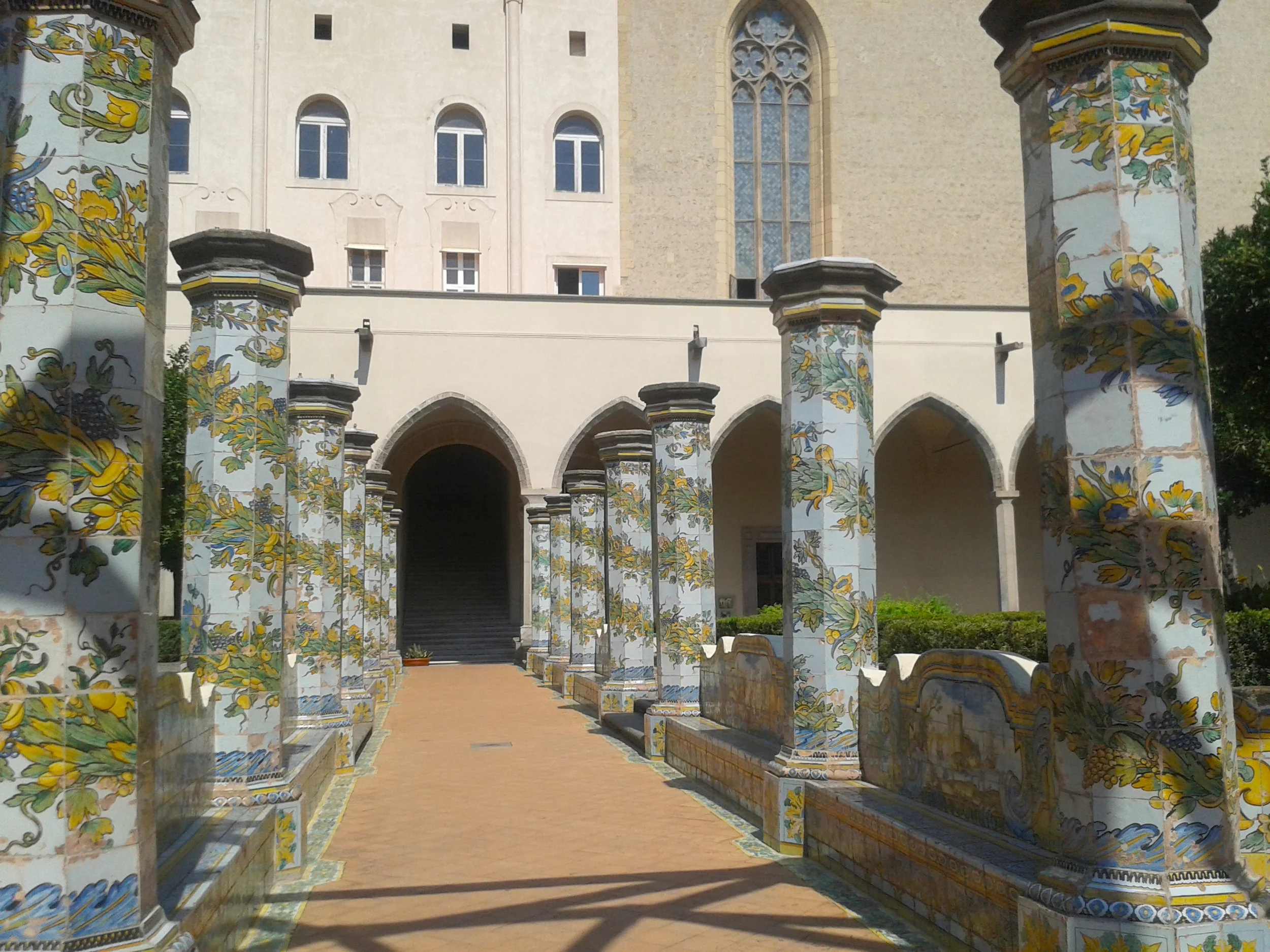 The cloister with maiolica decorations.
