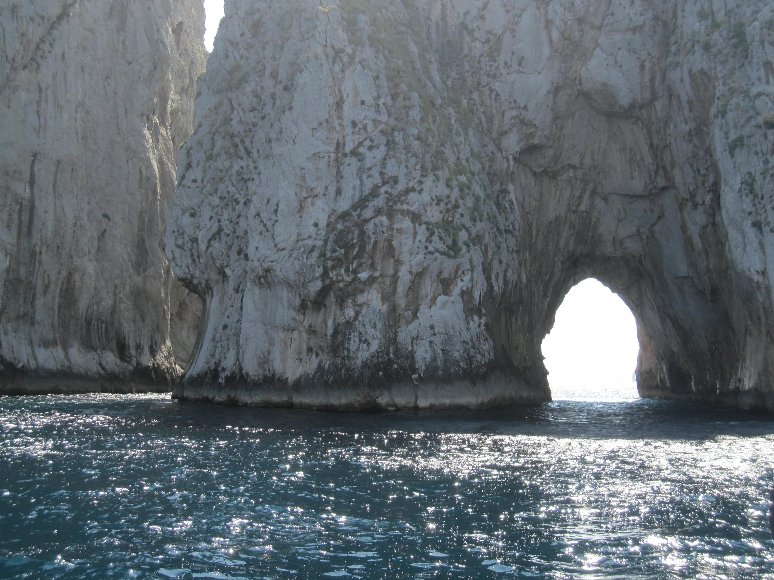 Under the famous Faraglioni. 